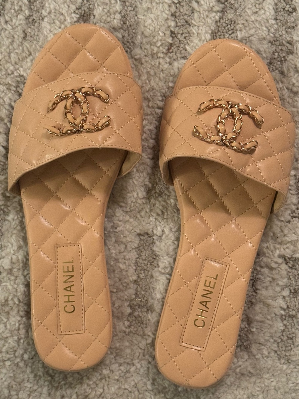 CHANEL Quilted Tan Leather Slide Mules with Gold CC Chain